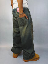 Load image into Gallery viewer, Distressed Denim Jeans
