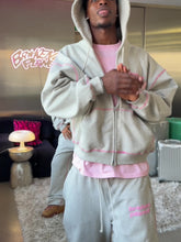 Load and play video in Gallery viewer, Star Logo Covered Stitch Sweatpants
